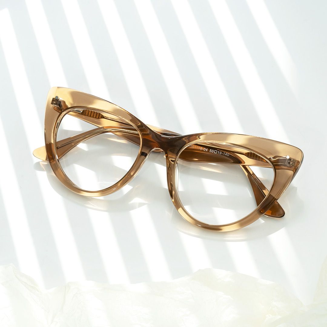 model wearing Akua - Cat Eye Brown Eyeglasses 1