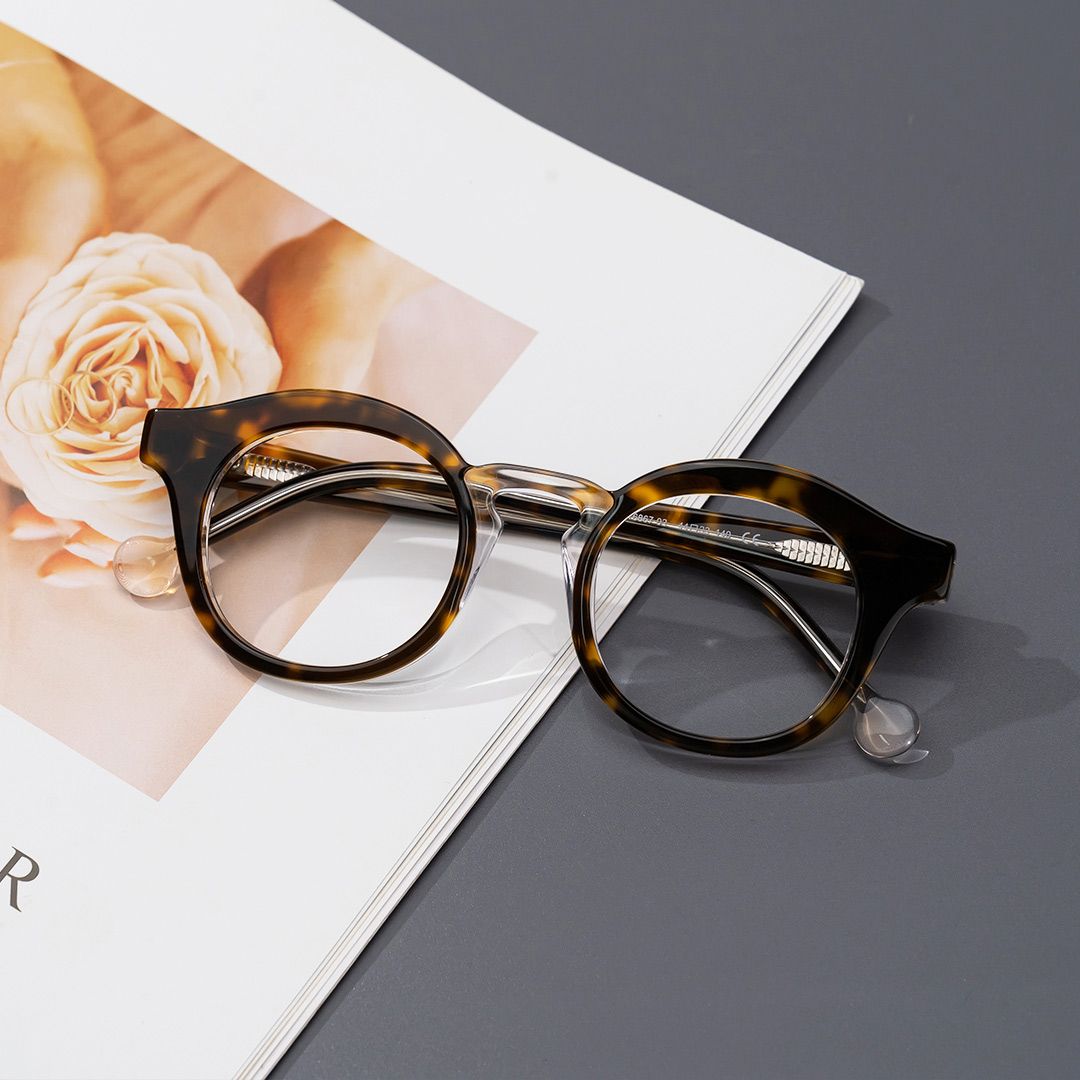 model wearing Carmona - Round Tortoise Eyeglasses 1