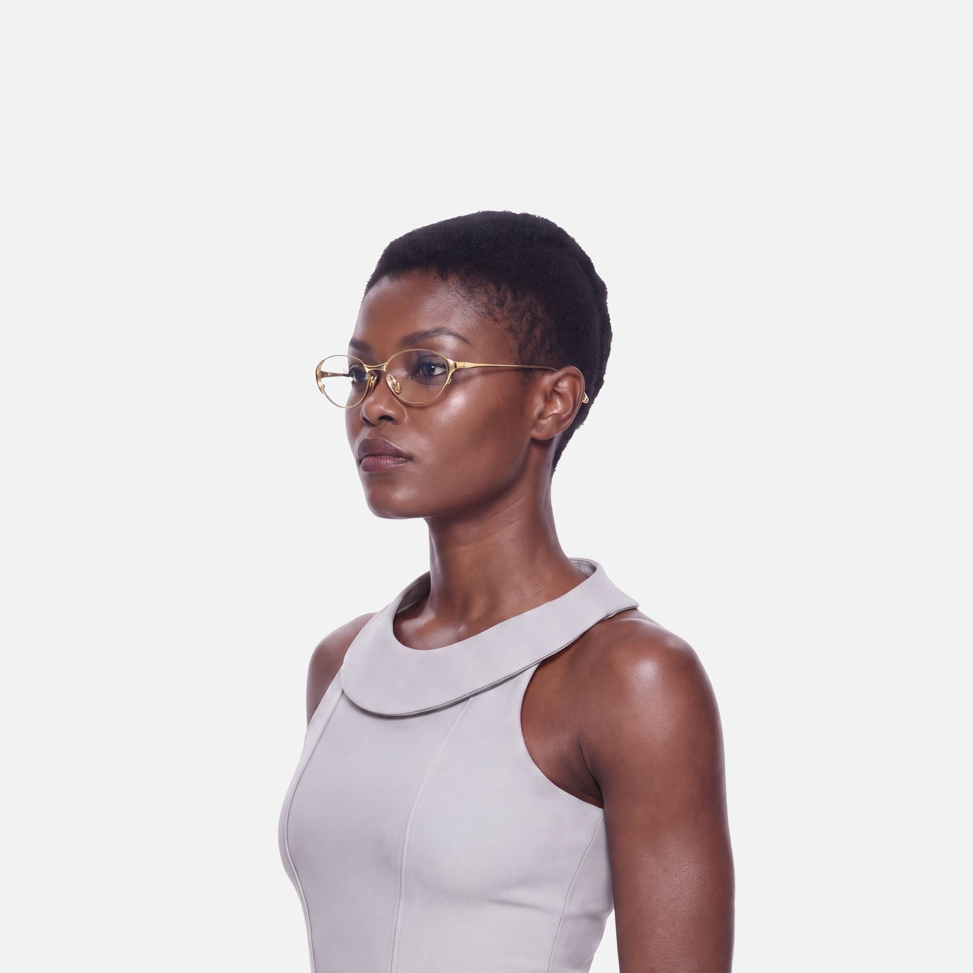 Ebisu - Retro Gold Oval Glasses with Ti Nose Pads by Vooglam - Side View On Model