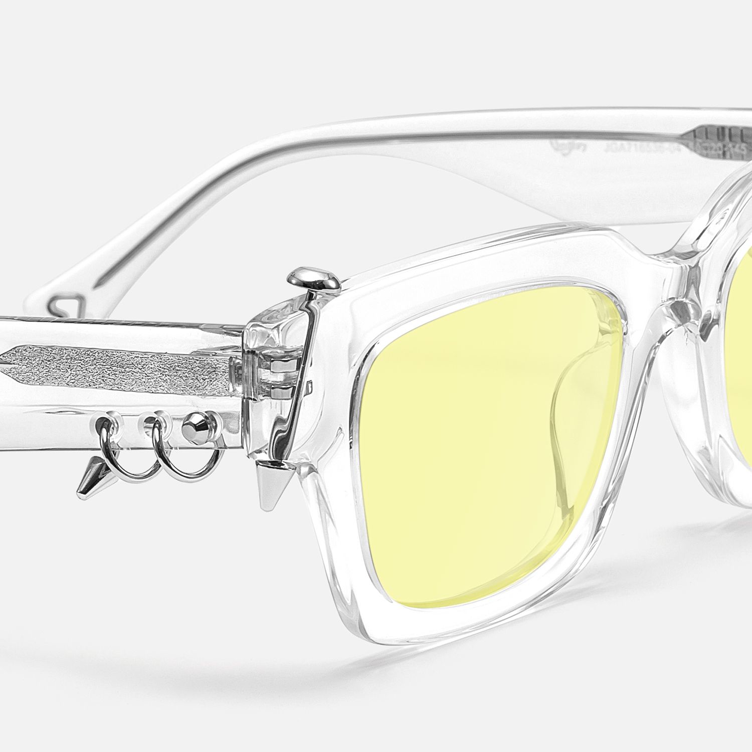 Sabrina - Clear Pierced Yellow Tint Sunglasses by Vooglam - Design Details