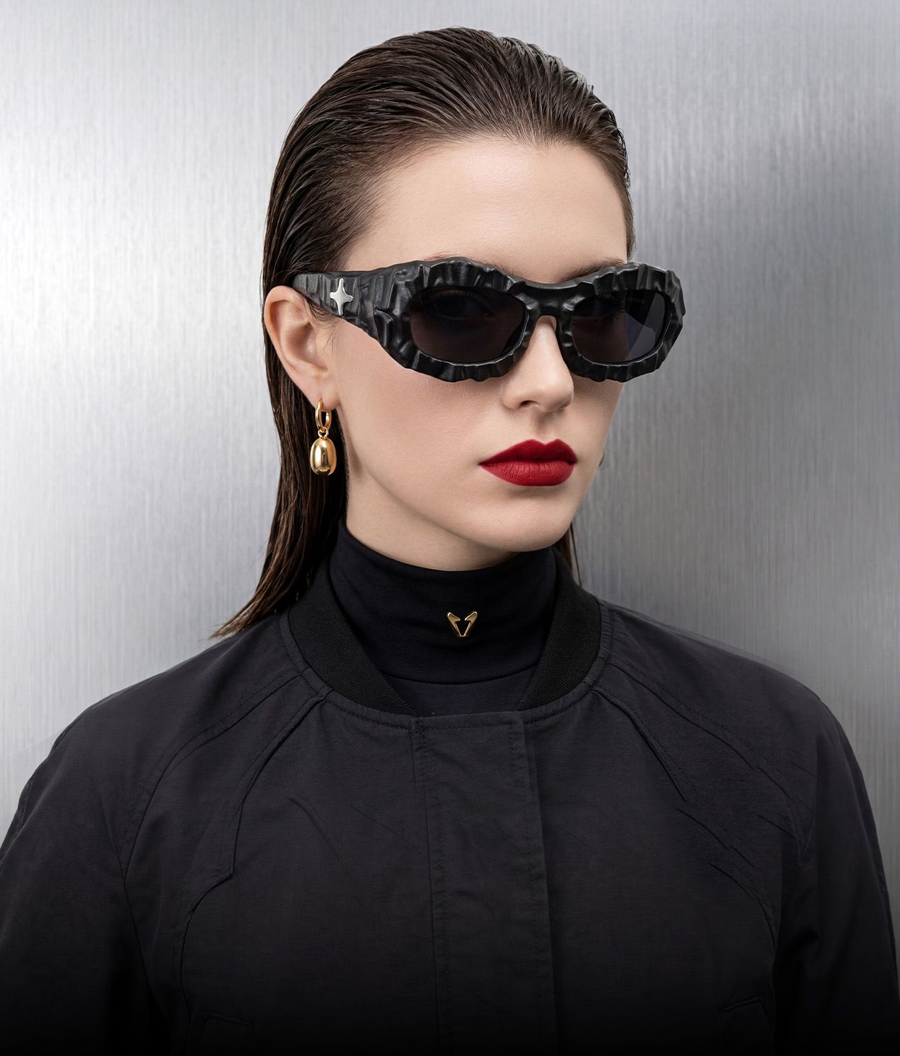 model wearing Lizzy - Geometric Gold Eyeglasses 1